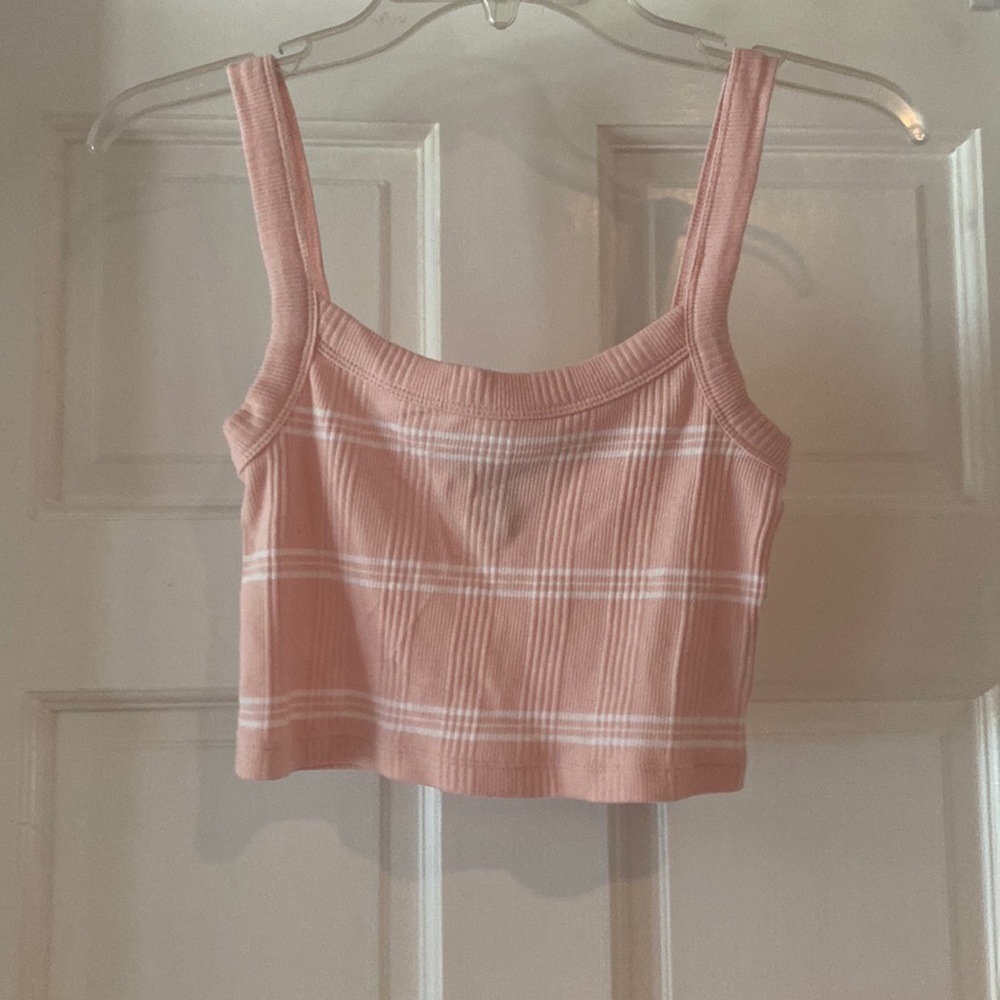Pink and white striped tank top.